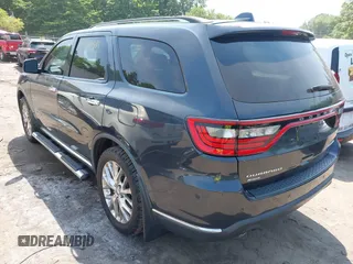 2014 Dodge Durango Citadel with VIN 1C4RDJEG8EC480656, listed as a IAAI auction lot 42438581 with 182,615 mi miles and . Bid and sale history available at DreamBid. Image 3.