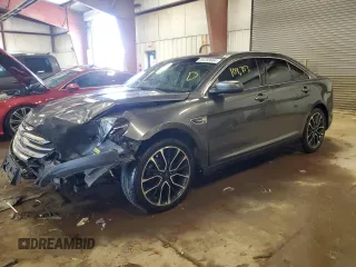 2017 Ford Taurus SEL z VIN 1FAHP2H83HG125684, wystawiony jako Copart lot #65288664 z przebiegiem 104 753 mil mil oraz Szkoda całkowita • Salvage title. Historia ofert i sprzedaży dostępna na DreamBid. Obrazek 1.