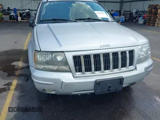 2004 Jeep Grand Cherokee Laredo with VIN 1J4GX48S34C258227, listed as a IAAI auction lot 42616107 with 160,424 mi miles and . Bid and sale history available at DreamBid. Image 6.