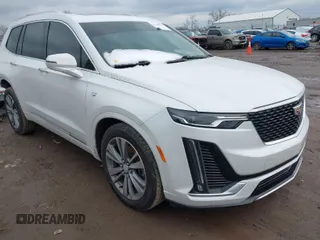 2020 Cadillac XT6 AWD Premium Luxury with VIN 1GYKPDRS1LZ132341, listed as a IAAI auction lot 41548043 with 60,821 mi miles. Bid and sale history available at carsss.com. Image 1.