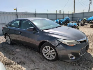 2015 Toyota Avalon Limited with VIN 4T1BK1EB9FU163116, listed as a Copart auction lot 52743545 with 151,449 mi miles and Salvage Title. Bid and sale history available at DreamBid. Image 4.