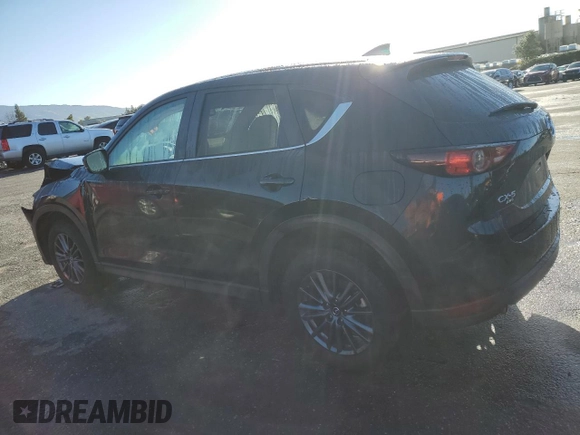 2021 Mazda CX-5 Touring with VIN JM3KFBCM5M1484465, listed as a Copart auction lot 44201845 with 23,777 mi miles and Salvage Title. Bid and sale history available at carsss.com. Image 2.