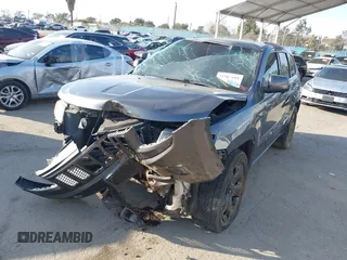2014 Jeep Grand Cherokee Laredo with VIN 1C4RJEAG8EC529103, listed as a IAAI auction lot 41567193 with 163,944 mi miles. Bid and sale history available at carsss.com. Image 17.