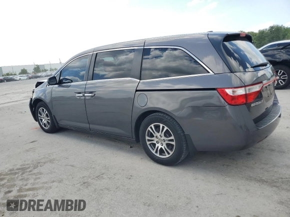 2012 Honda Odyssey EX-L with VIN 5FNRL5H65CB055196, listed as a Copart auction lot 50858245 with 115,047 mi miles and Salvage Title. Bid and sale history available at carsss.com. Image 2.