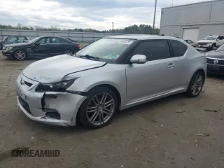 2013 Scion tC with VIN JTKJF5C79D3063104, listed as a Copart auction lot 52823475 with 107,358 mi miles and Salvage Title. Bid and sale history available at carsss.com. Image 1.