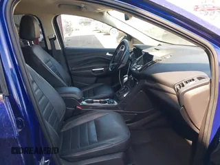 2016 Ford Escape Titanium with VIN 1FMCU9JXXGUB58961, listed as a IAAI auction lot 41772977 with 122,665 mi miles. Bid and sale history available at carsss.com. Image 5.