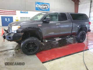 2011 Toyota Tundra 4WD Truck LTD with VIN 5TFBY5F15BX196980, listed as a Copart auction lot 51797675 with 124,080 mi miles and Salvage Title. Bid and sale history available at carsss.com. Image 1.
