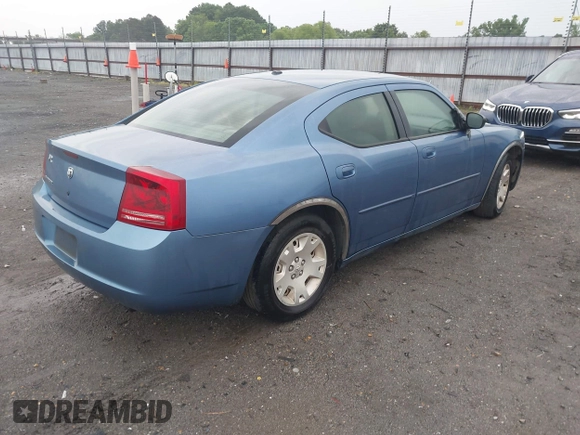 2007 Dodge Charger with VIN 2B3KA43RX7H676602, listed as a IAAI auction lot 42187317 with 323,520 mi miles and . Bid and sale history available at carsss.com. Image 4.