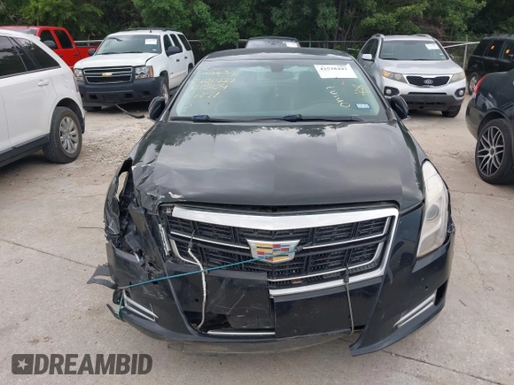 2017 Cadillac XTS Luxury z VIN 2G61M5S32H9158776, wystawiony jako IAAI lot #42528442 z przebiegiem 90 680 mil mil oraz . Historia ofert i sprzedaży dostępna na DreamBid. Obrazek 6.