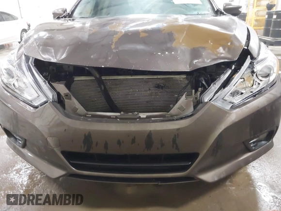 2016 Nissan Altima 2.5 S with VIN 1N4AL3AP4GC145811, listed as a IAAI auction lot 41424415 with 124,224 mi miles. Bid and sale history available at carsss.com. Image 6.