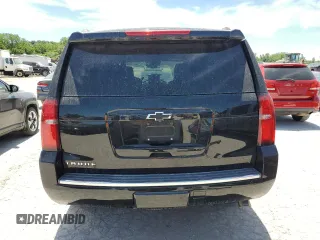 2015 Chevrolet Tahoe LTZ z VIN 1GNSKCKC8FR506151, wystawiony jako Copart lot #59948174 z przebiegiem Nie podano mil oraz Szkoda całkowita • Salvage title. Historia ofert i sprzedaży dostępna na DreamBid. Obrazek 6.