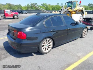 2011 BMW 3 Series 328i with VIN WBAPH7C54BE461860, listed as a IAAI auction lot 42011456 with 142,879 mi miles. Bid and sale history available at carsss.com. Image 4.