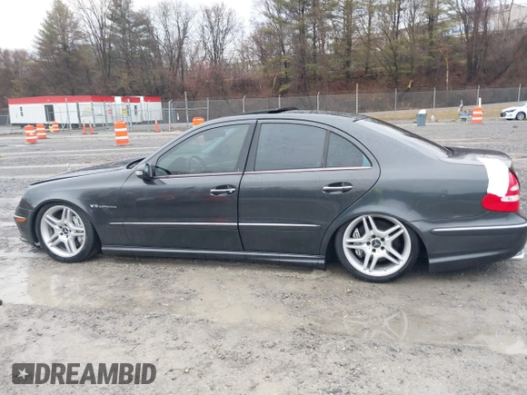 2003 Mercedes-Benz E-Class 5.5L AMG with VIN WDBUF76JX3A267197, listed as a IAAI auction lot 41485778 with 89,310 mi miles. Bid and sale history available at carsss.com. Image 14.