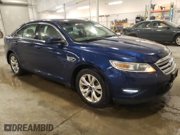 2012 Ford Taurus SEL with VIN 1FAHP2EW2CG143718, listed as a Copart auction lot 55443865 with 212,996 mi miles and Clean Title. Bid and sale history available at DreamBid. Image 4.
