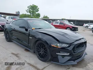 2018 Ford Mustang GT z VIN 1FA6P8CF9J5113704, wystawiony jako IAAI lot #42287251 z przebiegiem 65 781 mil mil oraz . Historia ofert i sprzedaży dostępna na DreamBid. Obrazek 1.