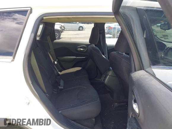 2016 Jeep Cherokee Latitude with VIN 1C4PJLCB0GW291357, listed as a IAAI auction lot 42312356 with 105,692 mi miles and . Bid and sale history available at DreamBid. Image 8.