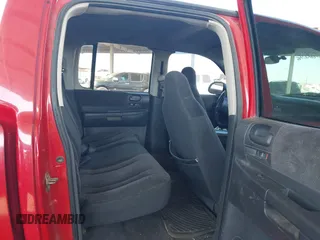 2004 Dodge Dakota Sport with VIN 1D7HL38N54S768570, listed as a IAAI auction lot 41323715 with 269,242 mi miles. Bid and sale history available at carsss.com. Image 7.