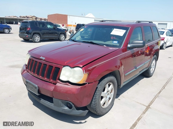 2009 Jeep Grand Cherokee Laredo with VIN 1J8GS48K39C521160, listed as a IAAI auction lot 42039577 with 262,829 mi miles. Bid and sale history available at carsss.com. Image 2.