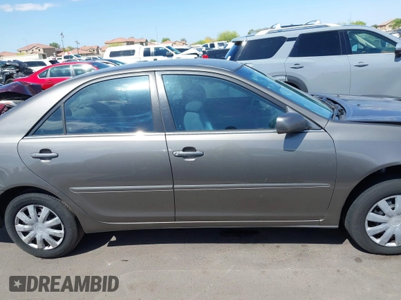 2004 Toyota Camry LE with VIN 4T1BE32K44U825561, listed as a IAAI auction lot 42051914 with 244,521 mi miles and . Bid and sale history available at DreamBid. Image 12.