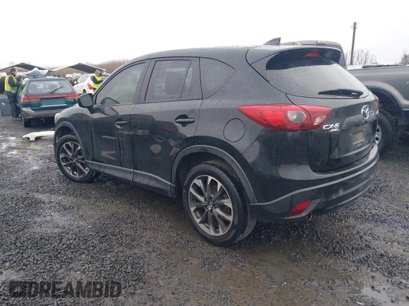 2016 Mazda CX-5 Grand Touring z VIN JM3KE4DY5G0742686, wystawiony jako IAAI lot #41598719 z przebiegiem 117 643 mil mil oraz . Historia ofert i sprzedaży dostępna na DreamBid. Obrazek 3.