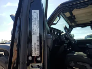 2023 Jeep Wrangler Sport with VIN 1C4HJXAG3PW618988, listed as a Copart auction lot 71615934 with 34,342 mi miles and Salvage title. Bid and sale history available at DreamBid. Image 12.
