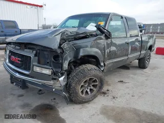 1999 GMC Sierra 2500 Crew Cab with VIN 1GTGK23R3XF050476, listed as a IAAI auction lot 41630143 with 158,655 mi miles. Bid and sale history available at carsss.com. Image 6.