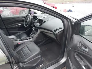 2014 Ford Escape SE with VIN 1FMCU9GX3EUB91417, listed as a IAAI auction lot 42009257 with 87,164 mi miles and . Bid and sale history available at DreamBid. Image 5.