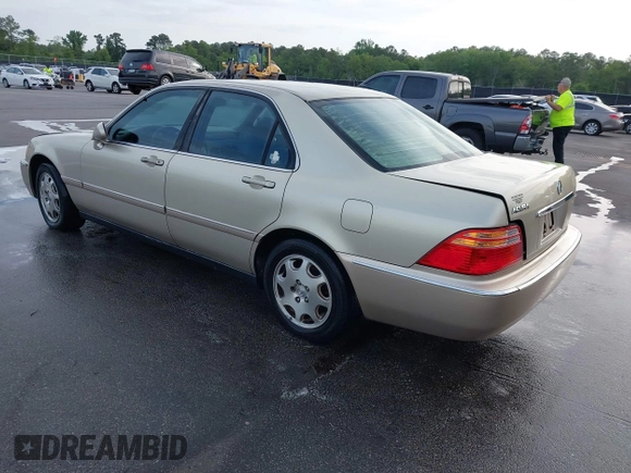 1999 Acura RL with VIN JH4KA9660XC007723, listed as a IAAI auction lot 42039719 with Not provided miles and . Bid and sale history available at DreamBid. Image 3.