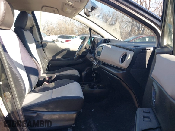 2012 Toyota Yaris L with VIN JTDKTUD31CD500337, listed as a IAAI auction lot 41410723 with 130,881 mi miles. Bid and sale history available at carsss.com. Image 5.
