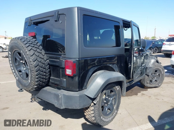 2014 Jeep Wrangler Sport with VIN 1C4AJWAG7EL100344, listed as a IAAI auction lot 42020438 with 87,279 mi miles and . Bid and sale history available at carsss.com. Image 4.