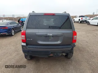 2014 Jeep Patriot Sport with VIN 1C4NJRBB2ED852114, listed as a IAAI auction lot 41521742 with 80,230 mi miles. Bid and sale history available at carsss.com. Image 16.