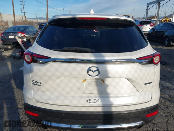2021 Mazda CX-9 Signature with VIN JM3TCBEY6M0536883, listed as a IAAI auction lot 41388130 with 65,613 mi miles. Bid and sale history available at carsss.com. Image 16.