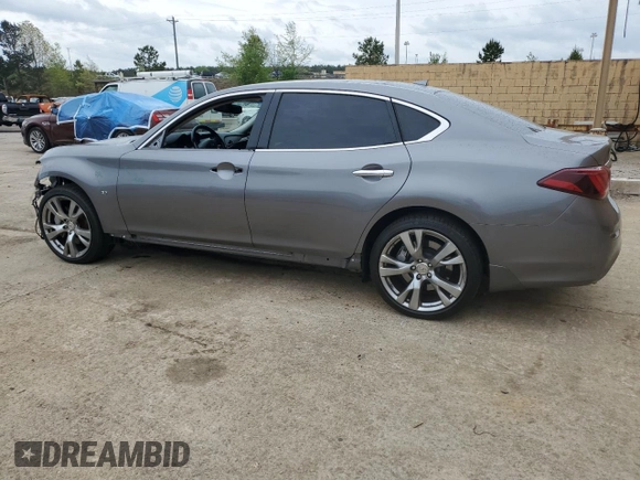 2015 Infiniti Q70 z VIN JN1BY1PR6FM831034, wystawiony jako Copart lot #51889835 z przebiegiem 128 220 mil mil oraz Szkoda całkowita • Salvage title. Historia ofert i sprzedaży dostępna na DreamBid. Obrazek 2.