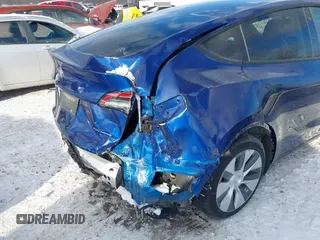 2021 Tesla Model Y Long Range with VIN 5YJYGDEE1MF083780, listed as a IAAI auction lot 41549308 with 37,372 mi miles and . Bid and sale history available at DreamBid. Image 6.