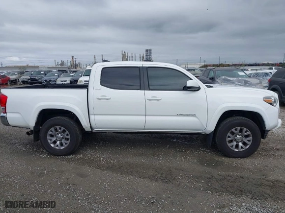 2017 Toyota Tacoma SR5 with VIN 3TMAZ5CN9HM040066, listed as a IAAI auction lot 41490470 with 119,221 mi miles. Bid and sale history available at carsss.com. Image 13.
