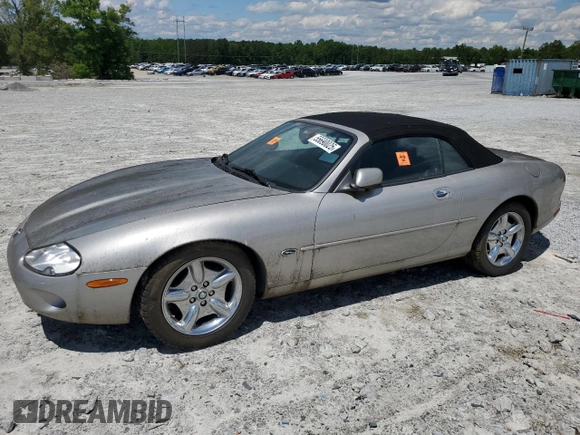 1999 Jaguar XK z VIN SAJGX2049XC034022, wystawiony jako Copart lot #55690025 z przebiegiem Nie podano mil oraz Tytuł czysty. Historia ofert i sprzedaży dostępna na DreamBid. Obrazek 1.