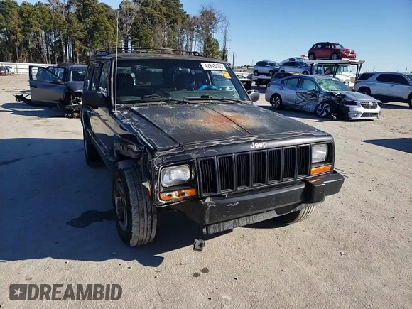 2000 Jeep Cherokee Classic with VIN 1J4FF58S3YL171454, listed as a Copart auction lot 42945485 with 218,721 mi miles and Salvage Title. Bid and sale history available at carsss.com. Image 11.