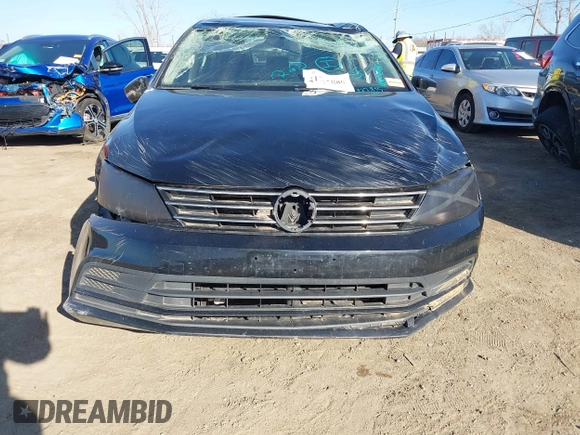 2015 Volkswagen Jetta SE z VIN 3VWD07AJ3FM266598, wystawiony jako IAAI lot #41757080 z przebiegiem 127 815 mil mil oraz . Historia ofert i sprzedaży dostępna na DreamBid. Obrazek 13.