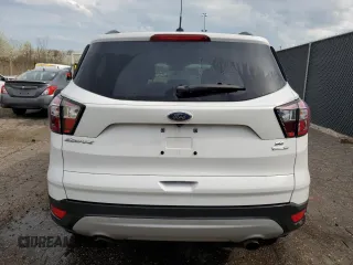 2018 Ford Escape SE with VIN 1FMCU9GD5JUA41244, listed as a Copart auction lot 54447615 with 128,542 mi miles and Clean Title. Bid and sale history available at carsss.com. Image 6.