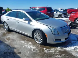 2013 Cadillac XTS Platinum with VIN 2G61V5S34D9160830, listed as a IAAI auction lot 41623040 with 174,839 mi miles. Bid and sale history available at carsss.com. Image 1.