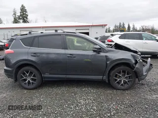 2018 Toyota RAV4 Hybrid SE with VIN JTMJJREV7JD208249, listed as a IAAI auction lot 41859301 with 91,899 mi miles and . Bid and sale history available at DreamBid. Image 13.