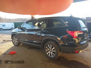 2022 Honda Pilot EX-L with VIN 5FNYF6H57NB035910, listed as a IAAI auction lot 41308742 with 43,059 mi miles. Bid and sale history available at carsss.com. Image 3.