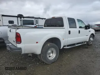 2001 Ford F-350 XL z VIN 1FTWW32F01ED08768, wystawiony jako Copart lot #62873634 z przebiegiem 317 184 mil mil oraz Szkoda całkowita • Salvage title. Historia ofert i sprzedaży dostępna na DreamBid. Obrazek 3.