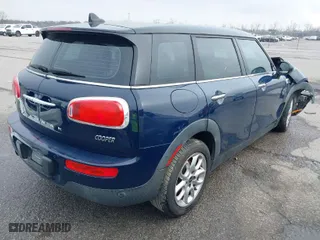 2016 MINI Cooper Clubman with VIN WMWLN5C54G2E30843, listed as a IAAI auction lot 41371368 with 1 mi miles. Bid and sale history available at carsss.com. Image 4.
