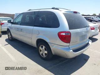 2005 Dodge Caravan SXT with VIN 2D4GP44L55R374299, listed as a IAAI auction lot 42560914 with 237,568 mi miles and . Bid and sale history available at DreamBid. Image 3.