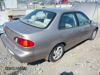 1998 Toyota Corolla VE z VIN 2T1BR18E2WC019524, wystawiony jako IAAI lot #41997009 z przebiegiem 255 968 mil mil oraz . Historia ofert i sprzedaży dostępna na DreamBid. Obrazek 4.