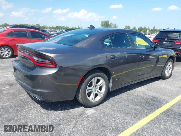 2023 Dodge Charger SXT with VIN 2C3CDXBG0PH571518, listed as a IAAI auction lot 42026774 with 47,394 mi miles and . Bid and sale history available at DreamBid. Image 4.