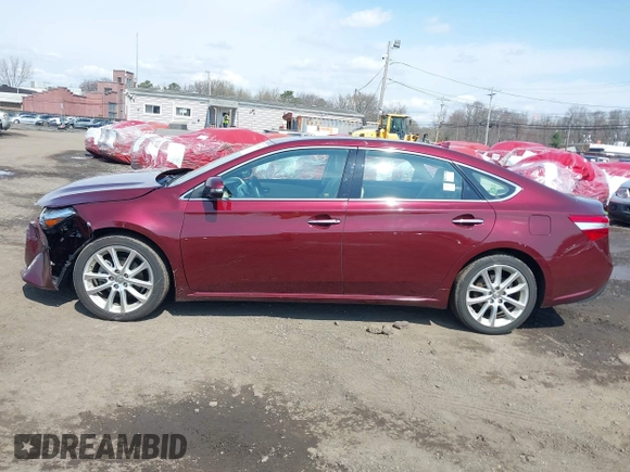 2014 Toyota Avalon Limited with VIN 4T1BK1EB1EU134577, listed as a IAAI auction lot 41994918 with 74,570 mi miles. Bid and sale history available at carsss.com. Image 14.