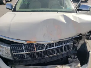 2007 Lincoln MKX z VIN 2LMDU68C27BJ22858, wystawiony jako Copart lot #54777825 z przebiegiem 147 548 mil mil oraz Szkoda całkowita • Salvage title. Historia ofert i sprzedaży dostępna na DreamBid. Obrazek 12.