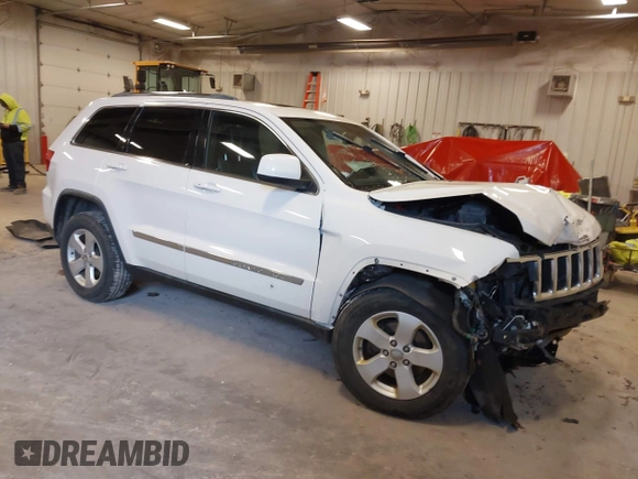 2011 Jeep Grand Cherokee 70th Anniversary with VIN 1J4RR4GG4BC702759, listed as a IAAI auction lot 41871604 with 143,583 mi miles. Bid and sale history available at carsss.com. Image 1.